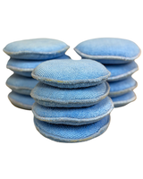 Twelve 5-inch diameter microfiber applicators arranged for display