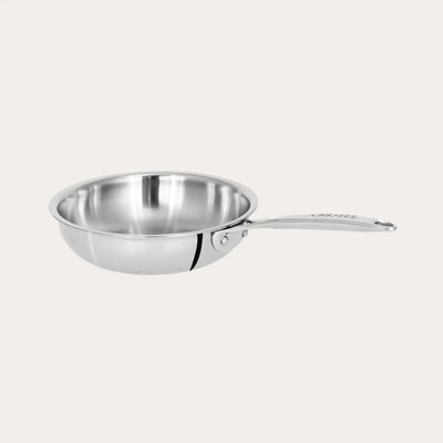 CRISTEL USA Mini Frying Pan in three sizes stacked on a wooden countertop