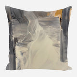 Square pillow featuring an abstract design with broad brushstrokes in beige, gray, black, and a hint of ochre, creating a flowing, textured pattern.