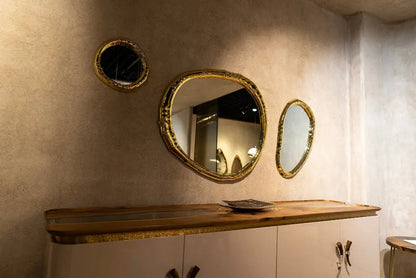 Modern resin and walnut credenza with aluminum legs in a stylish living room setting
