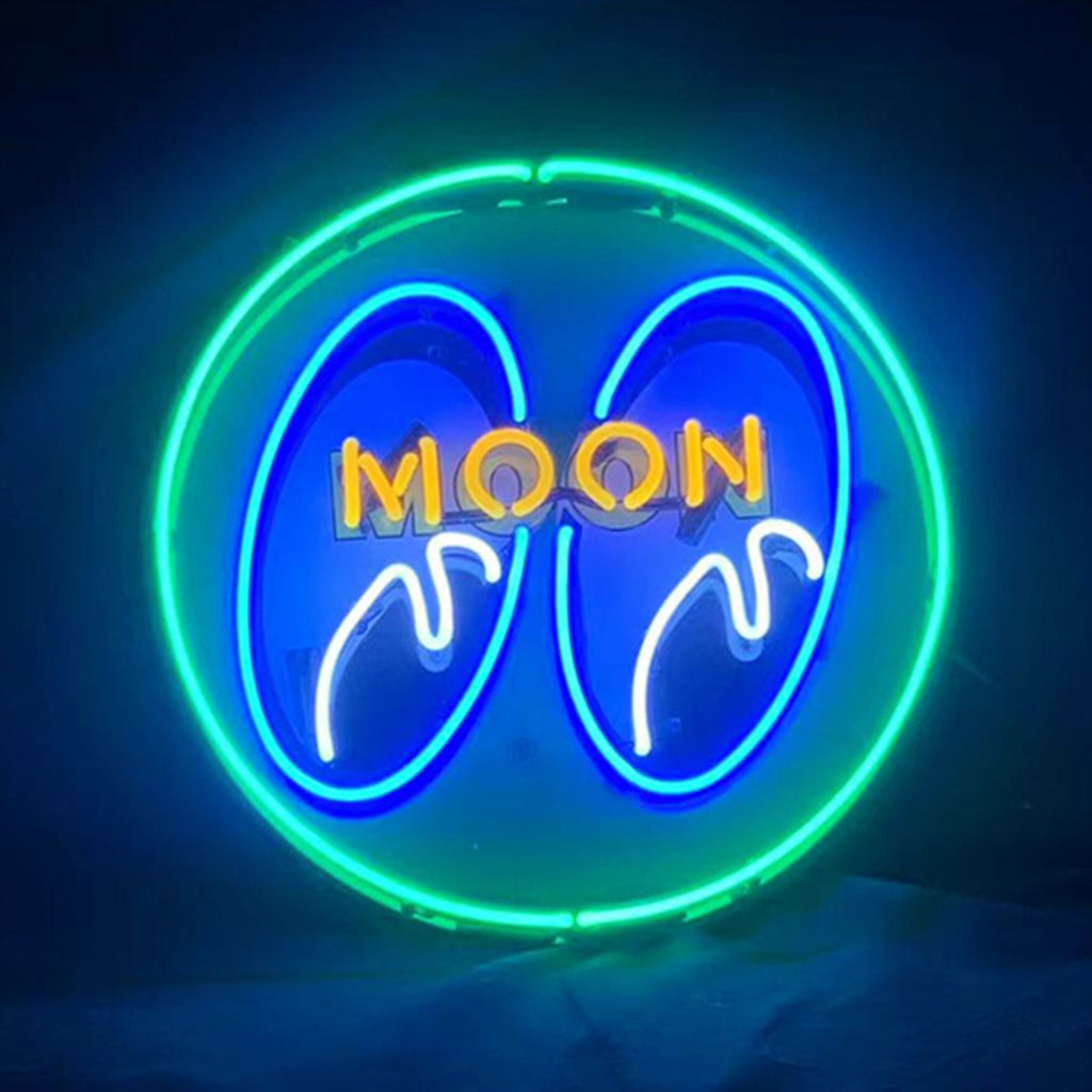 Moon Eyes Neon Signs Green illuminated on a wall, showing a glowing neon design with green light against acrylic or metal backing