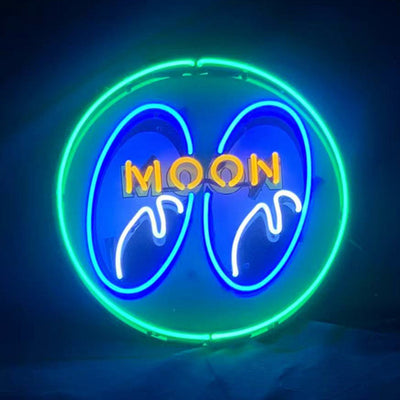 Moon Eyes Neon Signs Green illuminated on a wall, showing a glowing neon design with green light against acrylic or metal backing