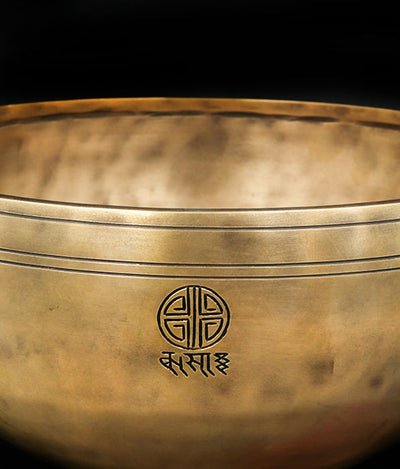 Bodhisattva Full Moon Tibetan Singing Bowl showing bronze bowl with Tibetan inscriptions and accompanying mallets
