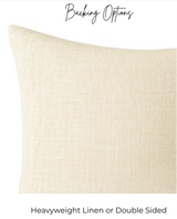 Close-up of a heavyweight linen pillow backing in a natural beige color with a subtle woven texture, shown from a slightly angled perspective.