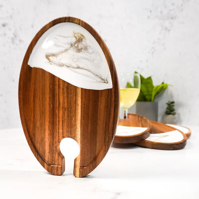 Set of four wine and appetizer trays made of acacia wood with resin details by Lynn & Liana Designs