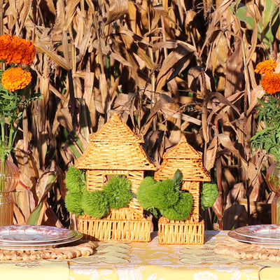 Pair of natural rattan pagoda lanterns, large and small sizes, displaying intricate handwoven details.