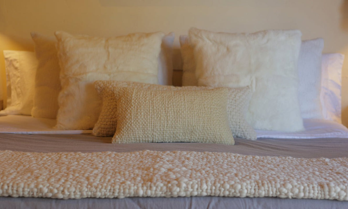 Rabbit Skin Pillow by Homelosophy