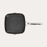 Non-stick Square grill by CRISTEL USA showing 28 x 28 cm size with stainless steel handle