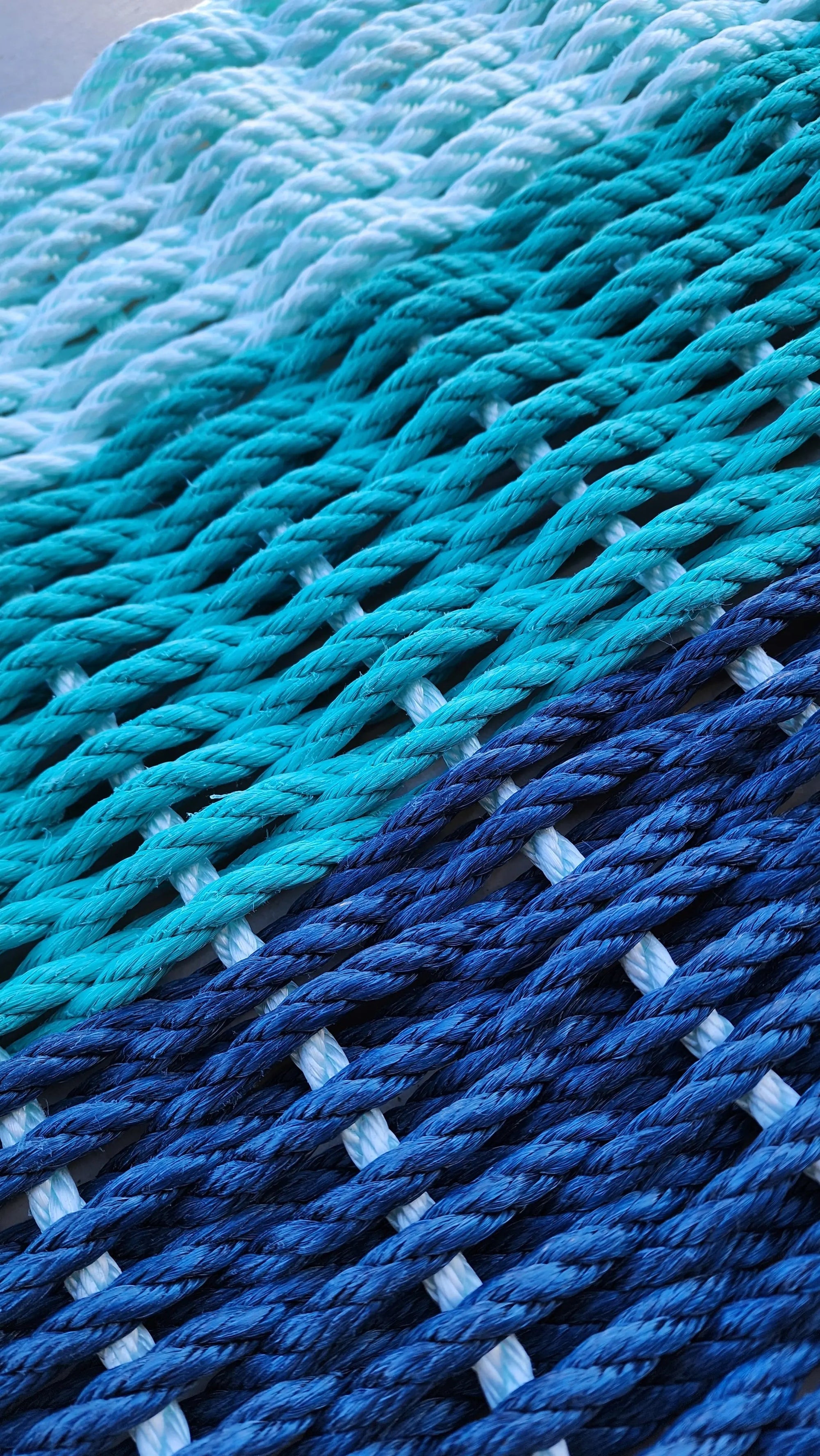 Handmade Ombre Rope Mat in Navy Blue, Teal, and Seafoam made with lobster rope