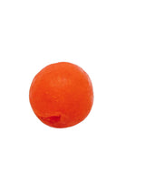 Small round bright orange sea glass ornament with a matte finish and smooth edges against a white background.