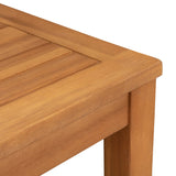 Close-up of a wooden side table corner with a smooth finish and slatted tabletop design in warm brown tones.