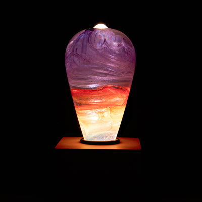 Passion Light Bulb decorative resin LED lamp with artistic glow, shown with wooden base options