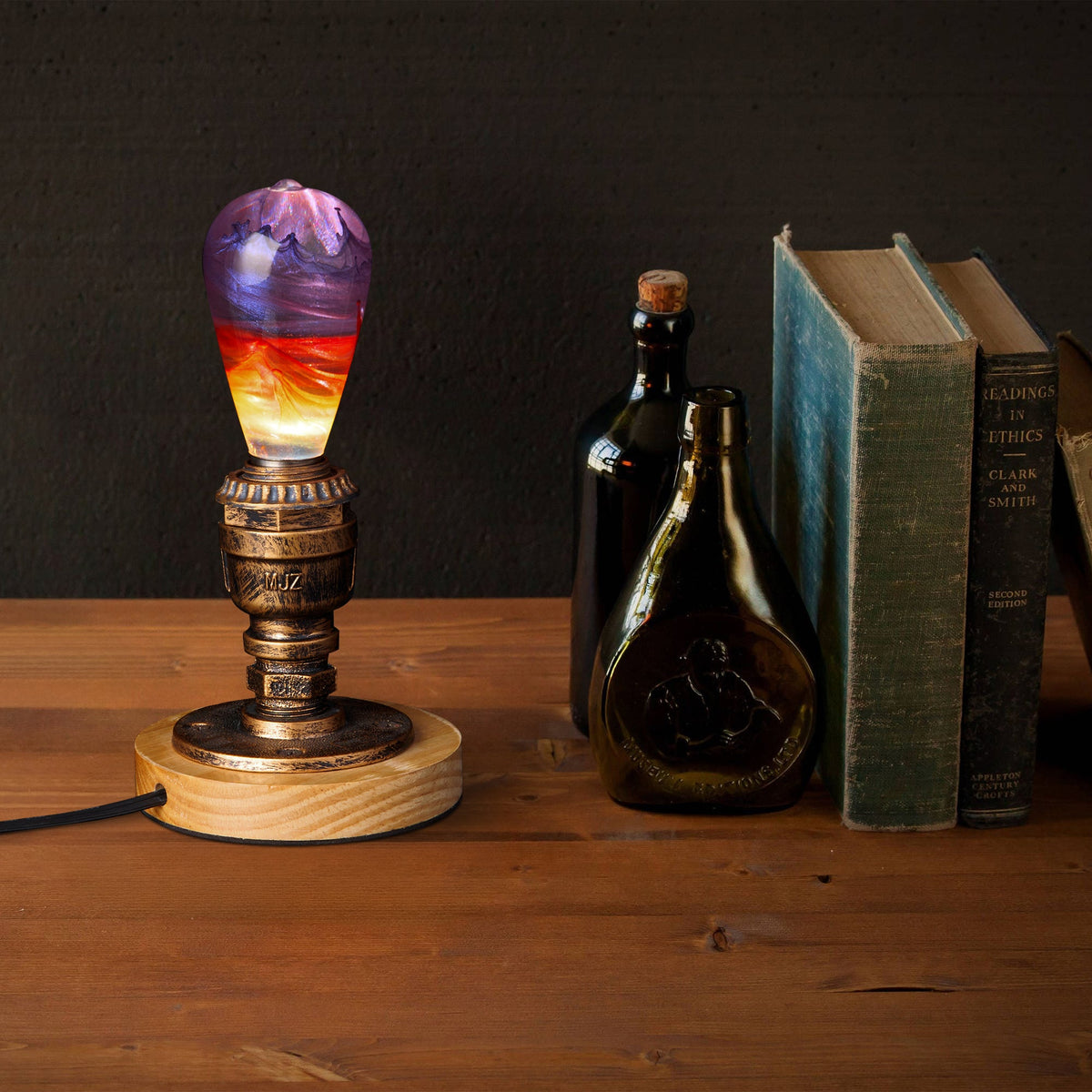 Passion Light Bulb decorative resin LED lamp with artistic glow, shown with wooden base options