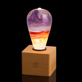 Passion Light Bulb decorative resin LED lamp with artistic glow, shown with wooden base options