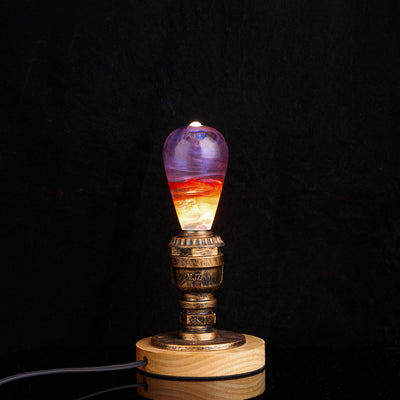 Passion Light Bulb decorative resin LED lamp with artistic glow, shown with wooden base options