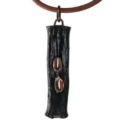 Chordis pendant necklace hand-shaped from Pacific Ocean algae on a natural leather cord