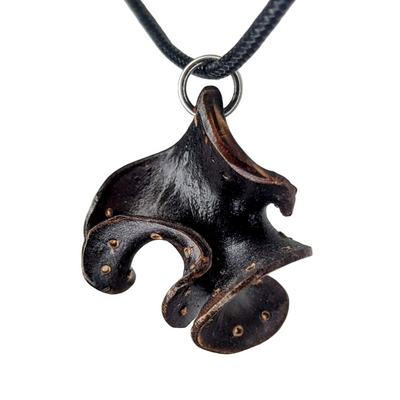 Halixen pendant necklace made from Pacific Ocean algae by Versiliy, shown on a natural leather cord