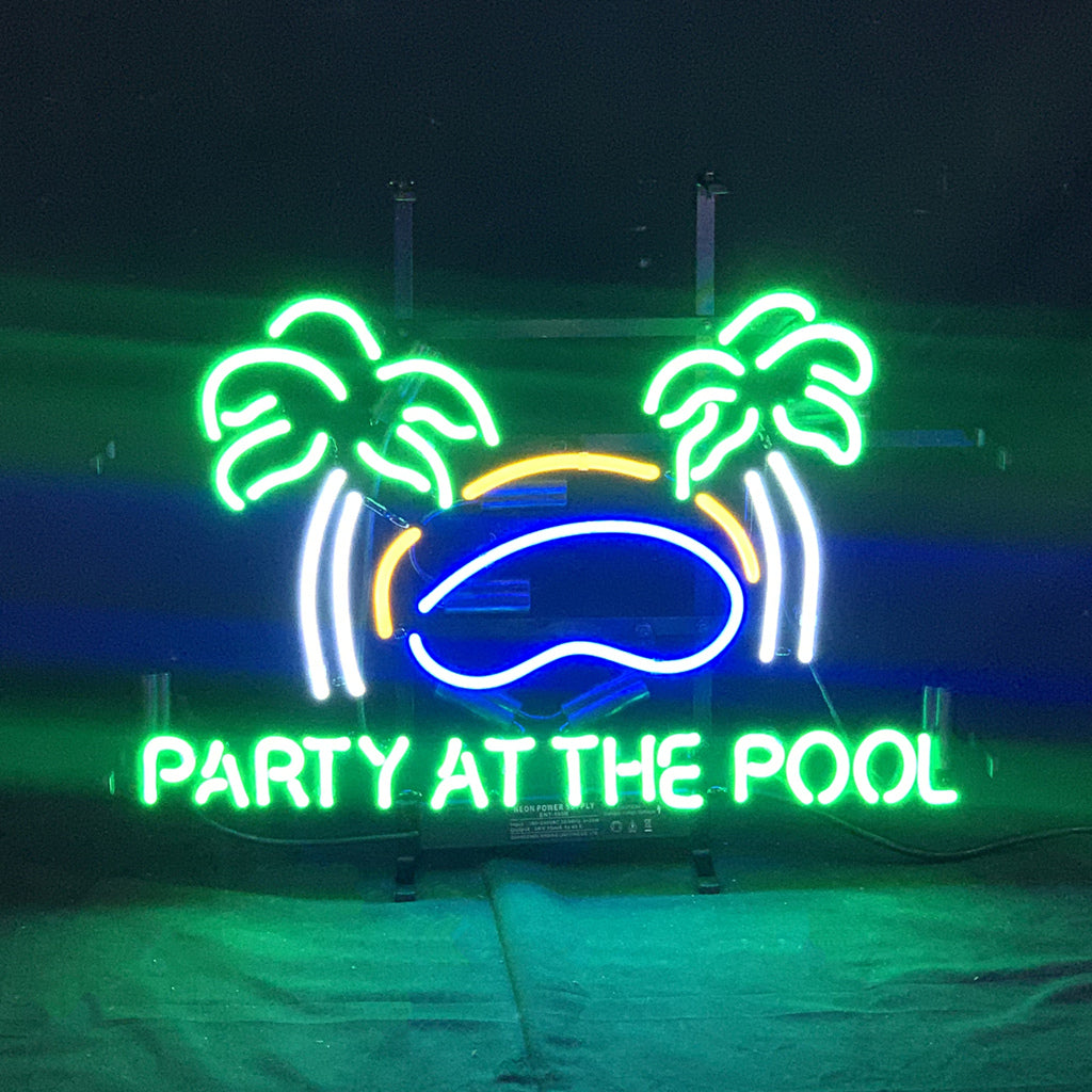 Party At The Pool Palm Tree Neon Sign glowing in an indoor setting