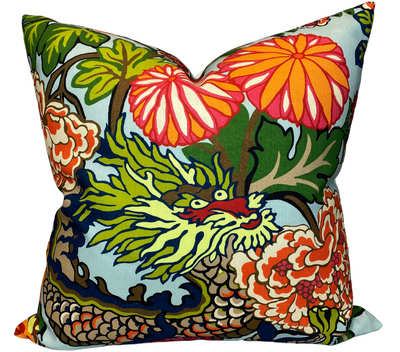 Chiang Mai Dragon Pillow Cover in aquamarine with floral pattern on sofa