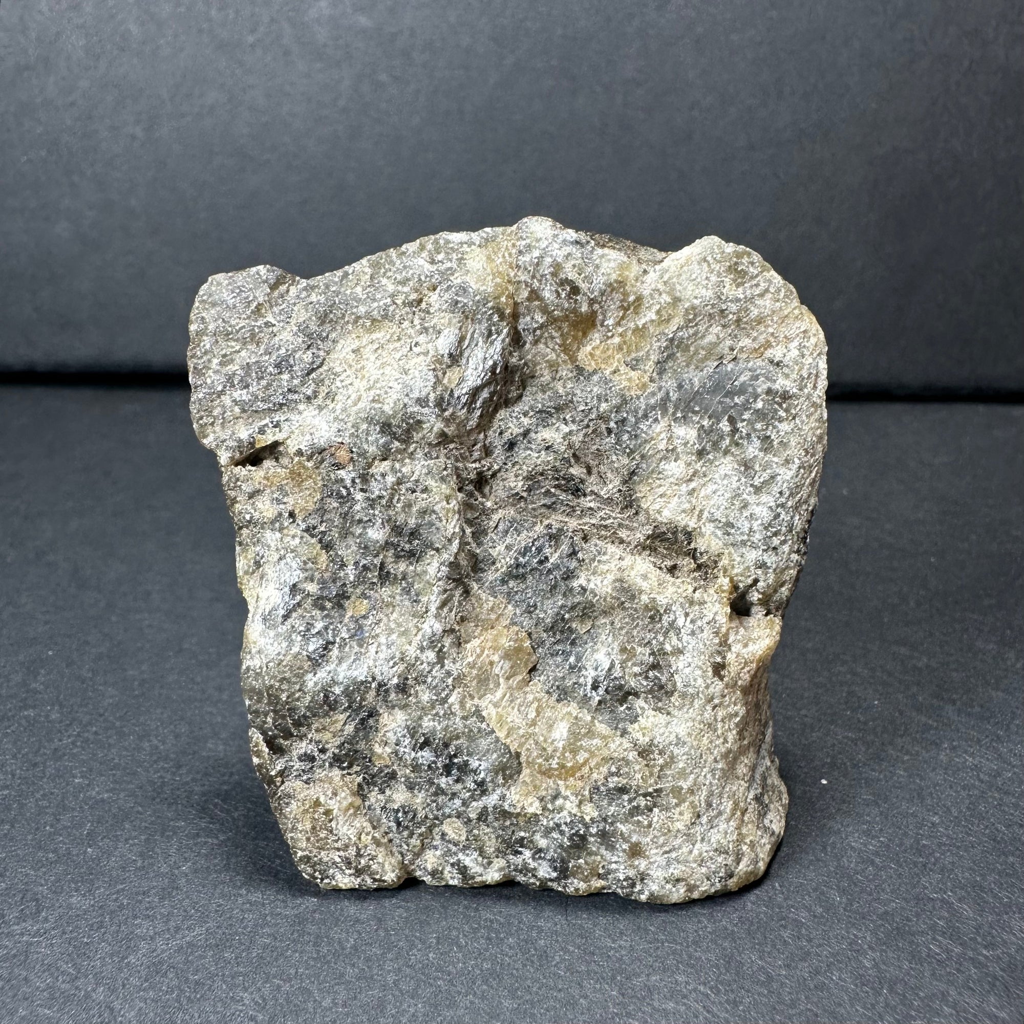 Rough labradorite mineral specimen from Madagascar with iridescent surface