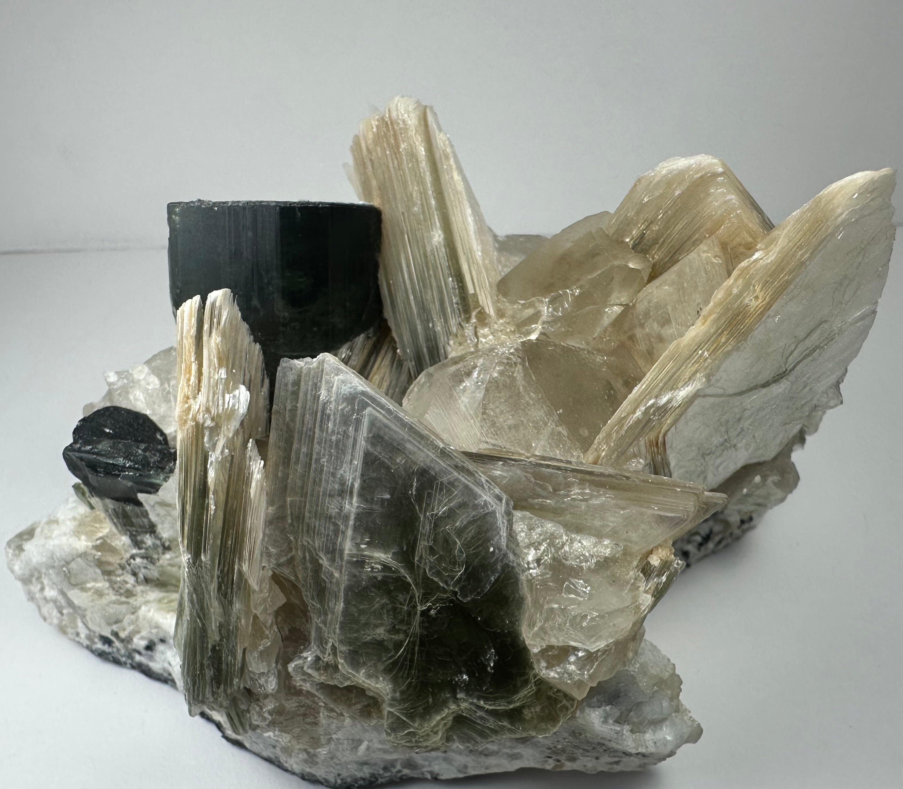 Blue indicolite tourmaline crystals on quartz and muscovite matrix from Nuristan, Afghanistan