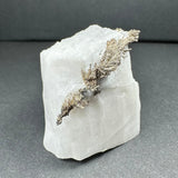 Native dendritic silver crystals on a calcite base mineral specimen from Morocco
