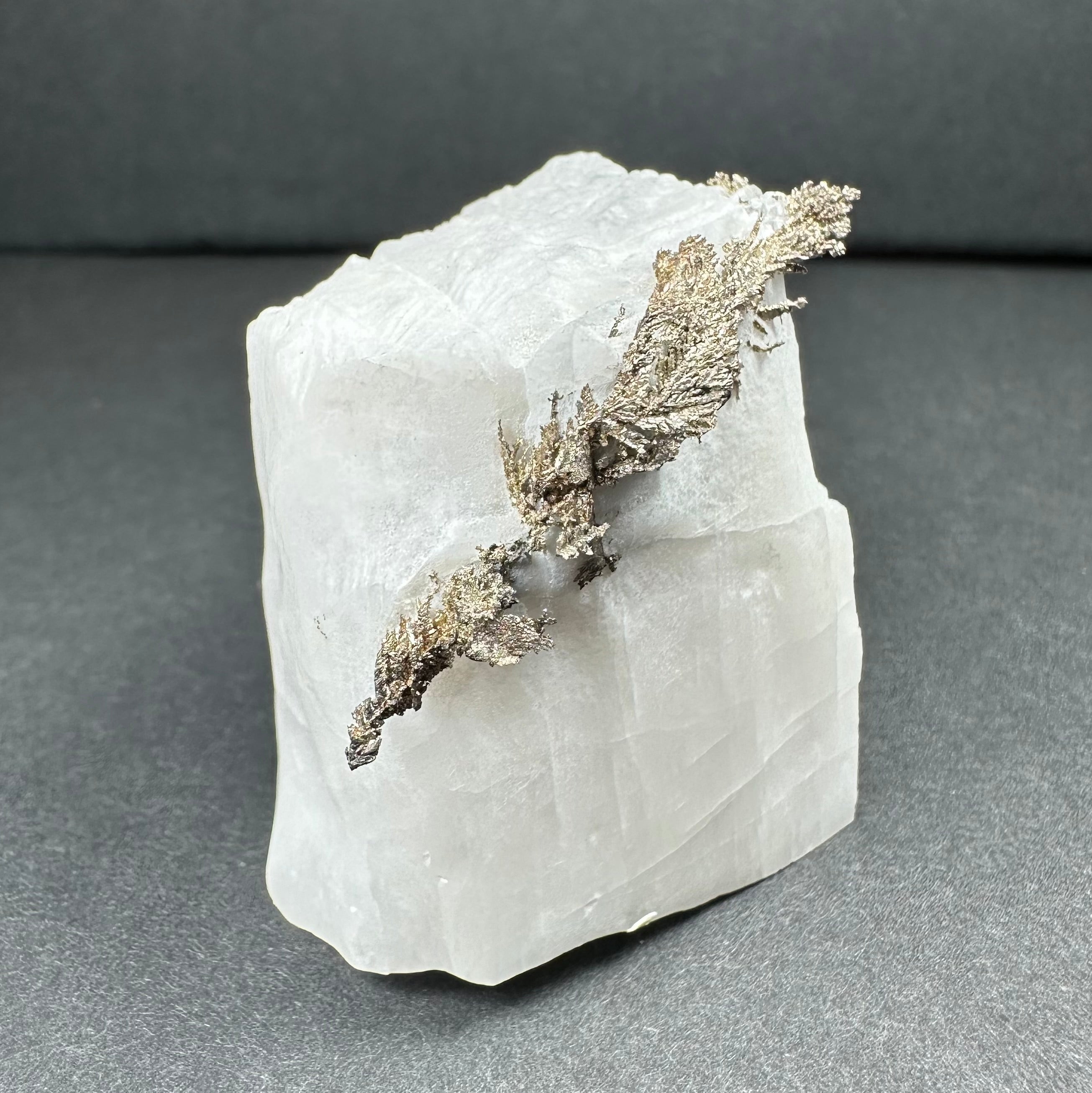 Native dendritic silver crystals on a calcite base mineral specimen from Morocco