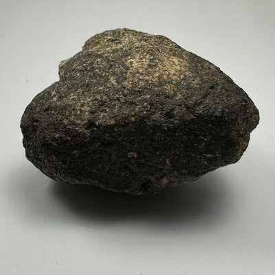 Chondrites Meteorite mineral specimen from South Sahara Desert, Morocco, shown in multiple close-up views
