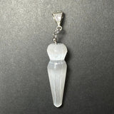 Translucent white selenite pendant with faceted, tapered shape and polished sterling silver clasp with engraved swirls on a gray background.