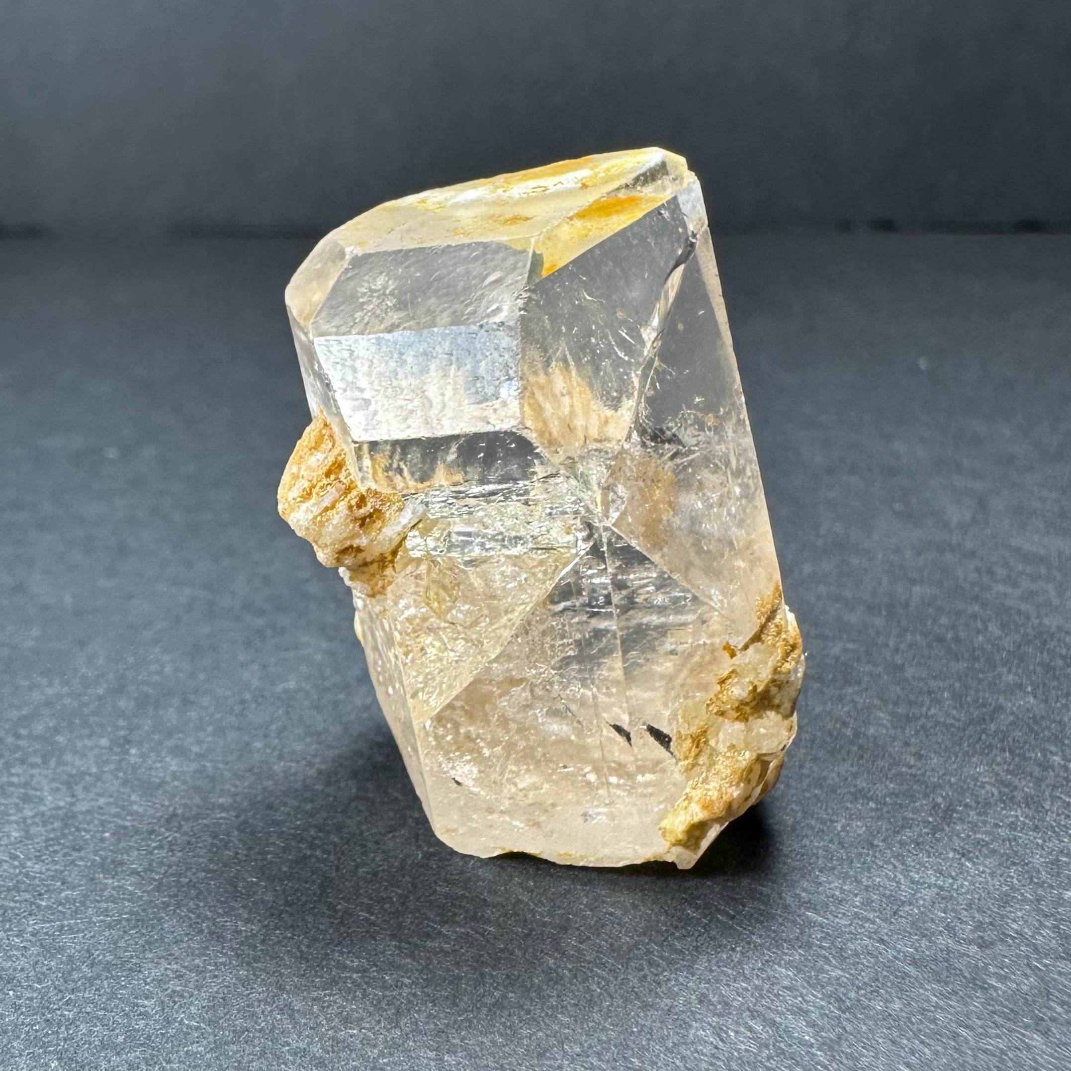 Golden Topaz Crystal specimen from Shigar Valley, Skardu, Pakistan displayed on black surface