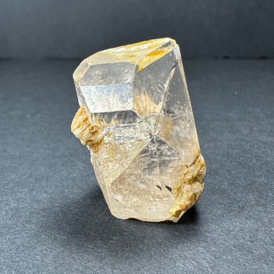 Golden Topaz Crystal specimen from Shigar Valley, Skardu, Pakistan displayed on black surface