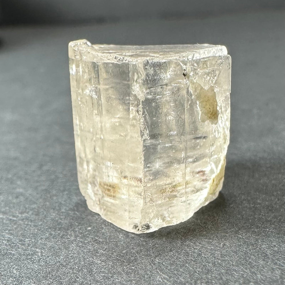 Golden Topaz Crystal from Shigar Valley, shown from multiple angles highlighting amber hues and crystal facets