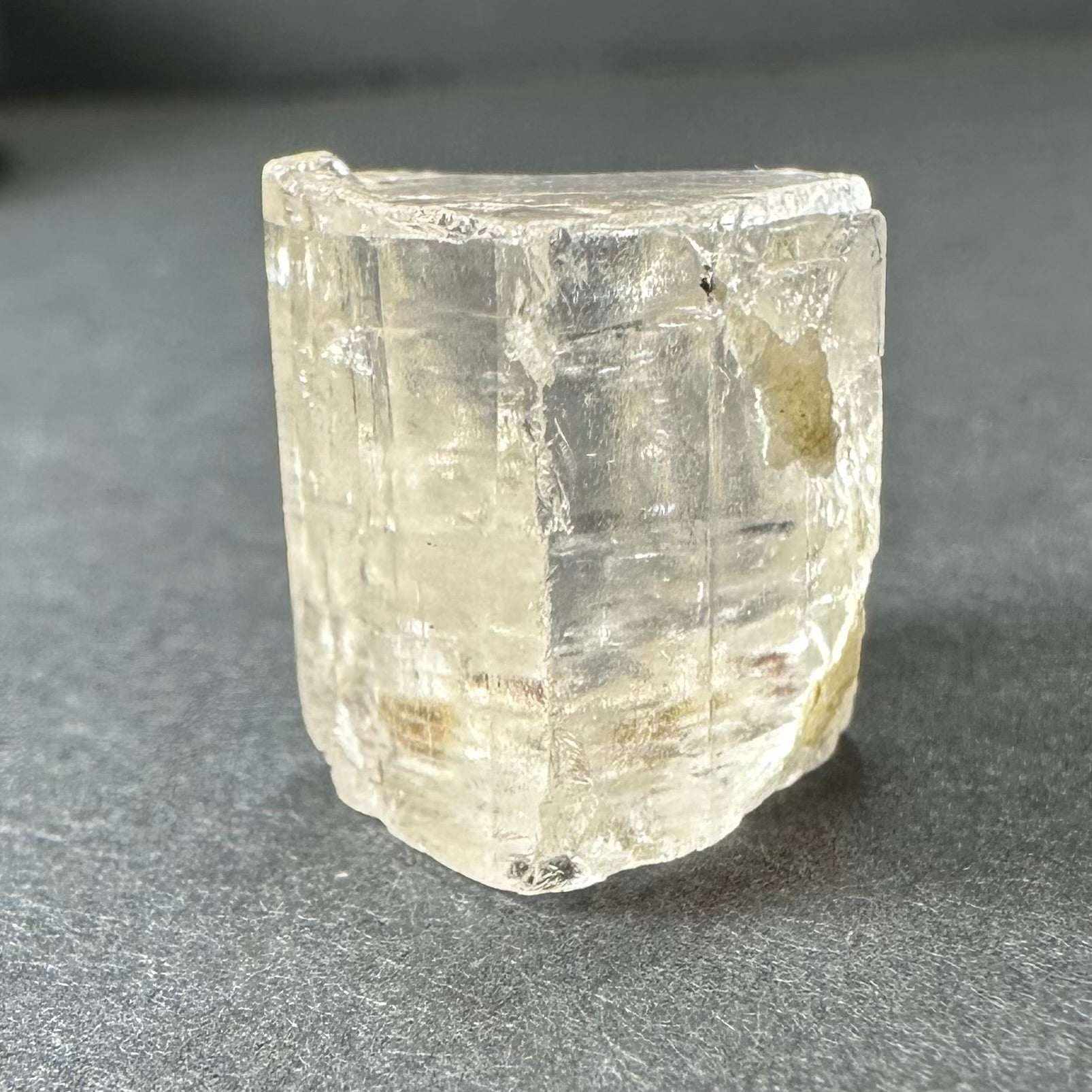 Golden Topaz Crystal from Shigar Valley, shown from multiple angles highlighting amber hues and crystal facets