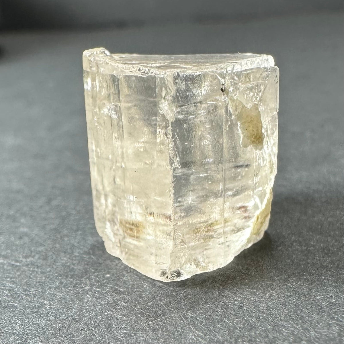 Golden Topaz Crystal from Shigar Valley, shown from multiple angles highlighting amber hues and crystal facets