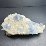 Celestite Crystals with Scalenohedral Calcite mineral specimen on matrix showing blue and creamy crystal formations