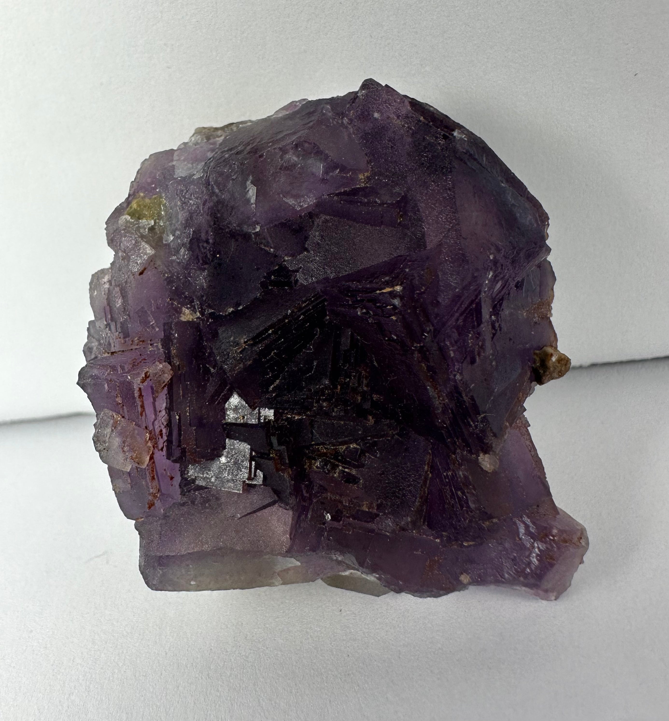 Purple Cubic Fluorite mineral specimen with cubic formations on matrix