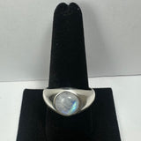 Moonstone Ring Size 11.5 made of sterling silver, displayed on a neutral surface