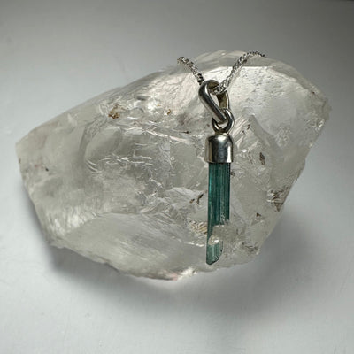 Natural Tourmaline Pencil Pendant in sterling silver setting with varied crystal coloration