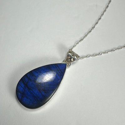 Labradorite Teardrop Pendant with deep blue stone set in sterling silver
