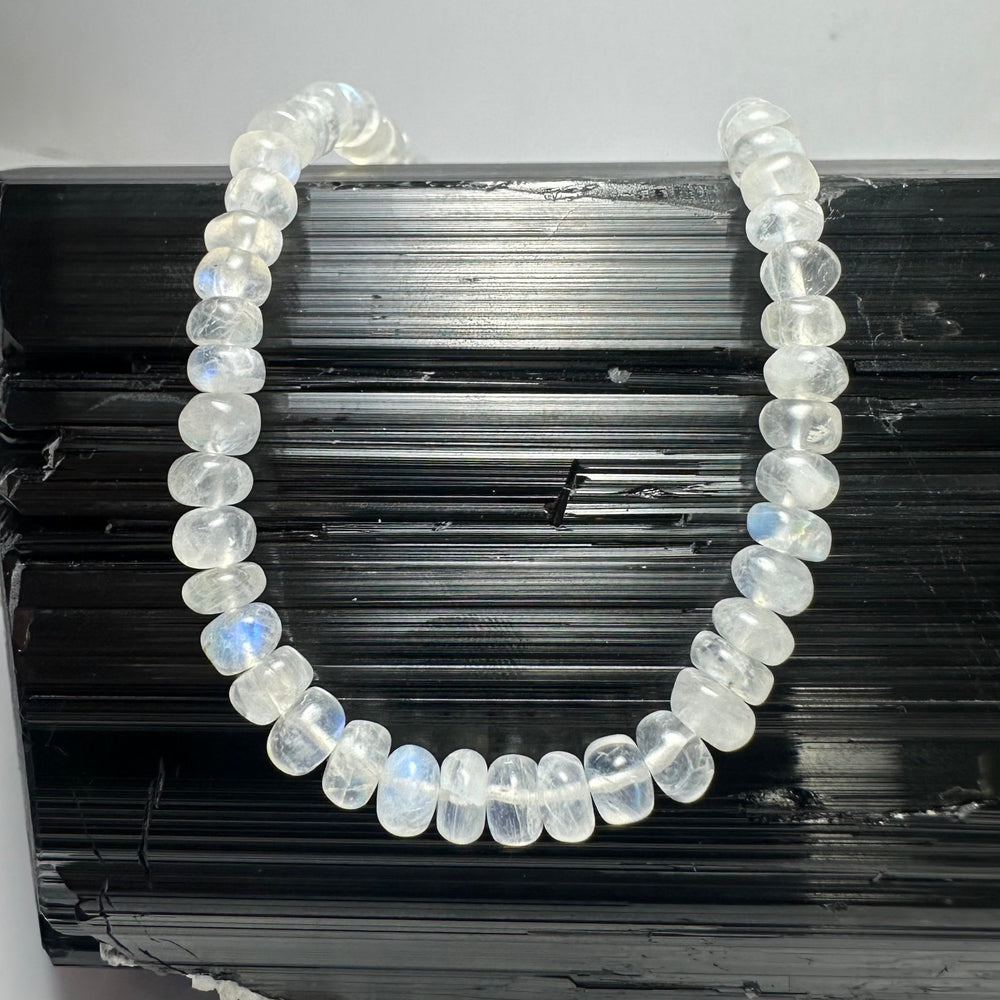 Close-up of Moonstone Rondele Bead Necklace showing moonstone beads and sterling silver chain
