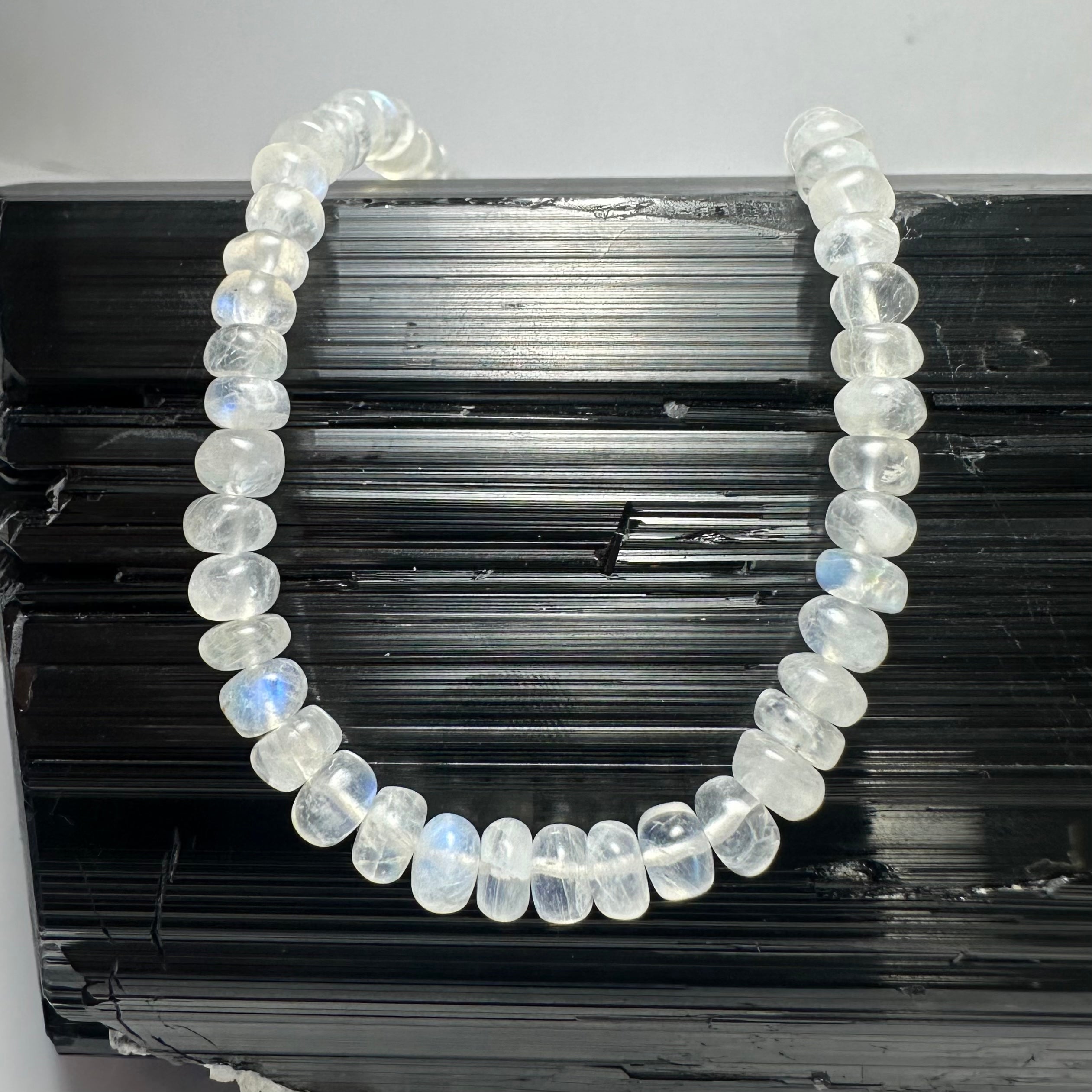 Close-up of Moonstone Rondele Bead Necklace showing moonstone beads and sterling silver chain