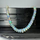 Welo Opal Graduated Bead Necklace from Ethiopia showing translucent opal beads on a white background