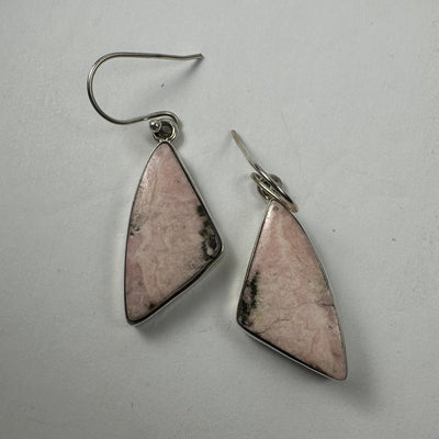 Close-up of Rhodonite Earrings with sterling silver clasp in Triangle and Freeform shapes