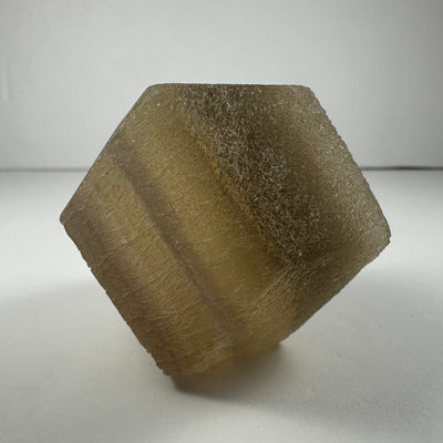 Fluorite dodecahedron mineral specimens in Yellow Banded and Purple Banded varieties, displayed on white background