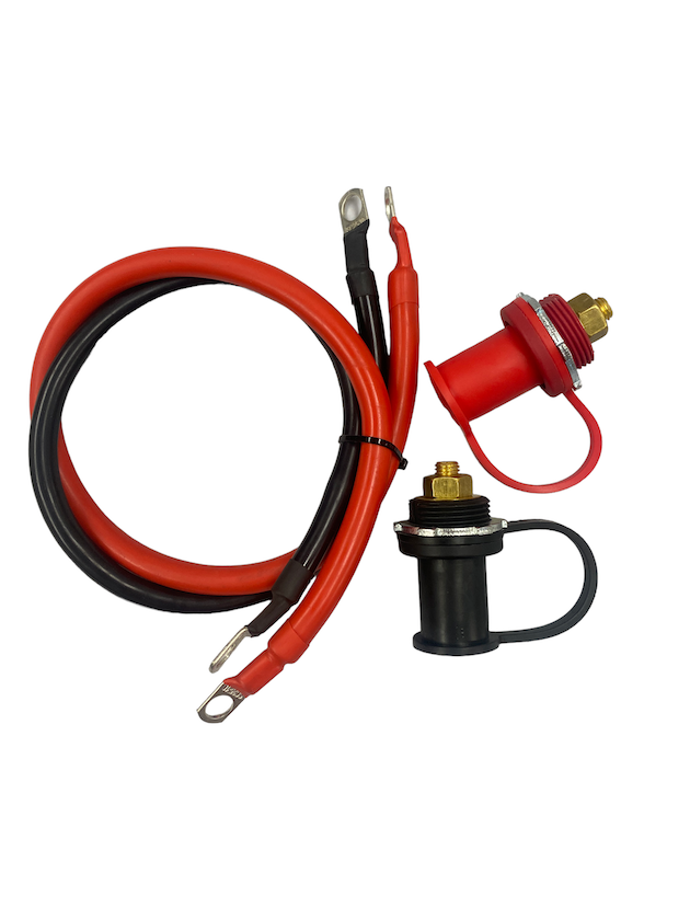 Red and black heavy-duty cables with ring terminals paired with red and black remote battery jump post connectors featuring protective caps.