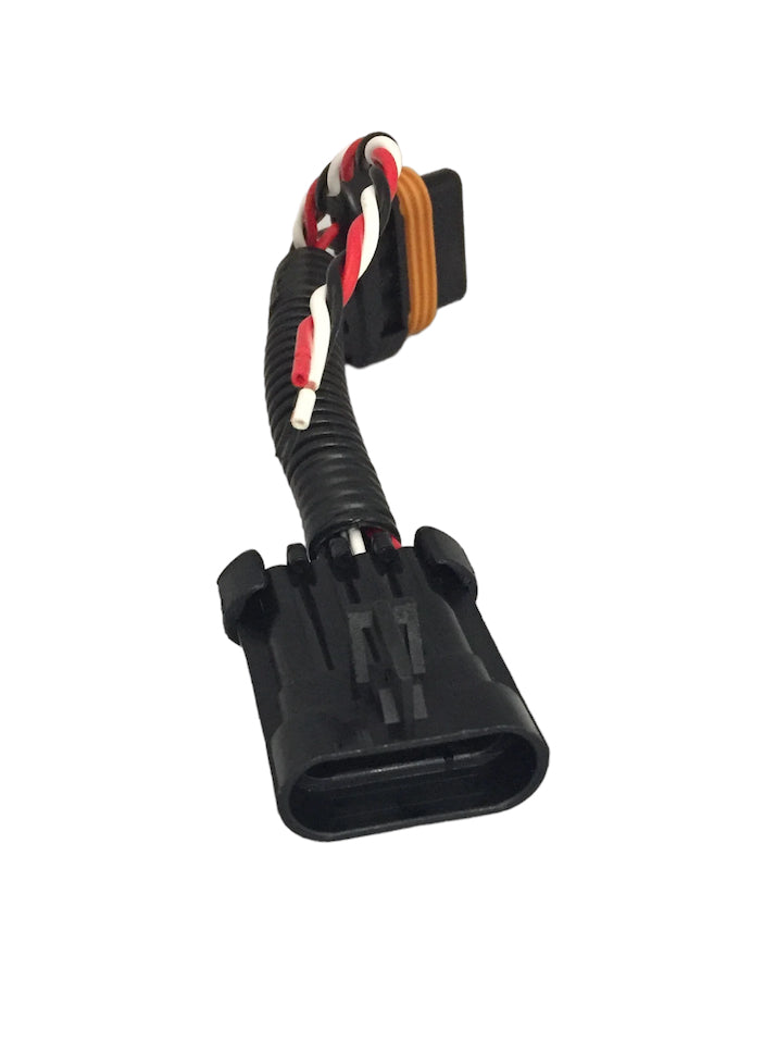 Black automotive plug and play wiring harness with coiled black protective sleeve and red, white striped twisted wire on white background.