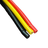 Close-up of three insulated electrical wires in black, yellow, and red, showing stripped copper ends against a white background.