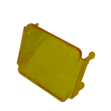 Transparent yellow rectangular LED pod lens cover with rounded edges and small mounting clips on each corner, shown against a white background.