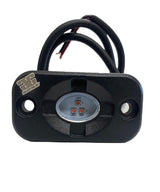 Rectangular black LED rock light with two red wires attached, featuring two visible LEDs and mounting holes on either side, shown from the front.