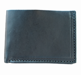 Black leather bifold wallet with visible stitching along edges, showing a smooth surface and minimal design, photographed from above on a white background.